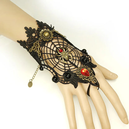 Bracelet gothique en dentelle – Crâne, squelette et araignée